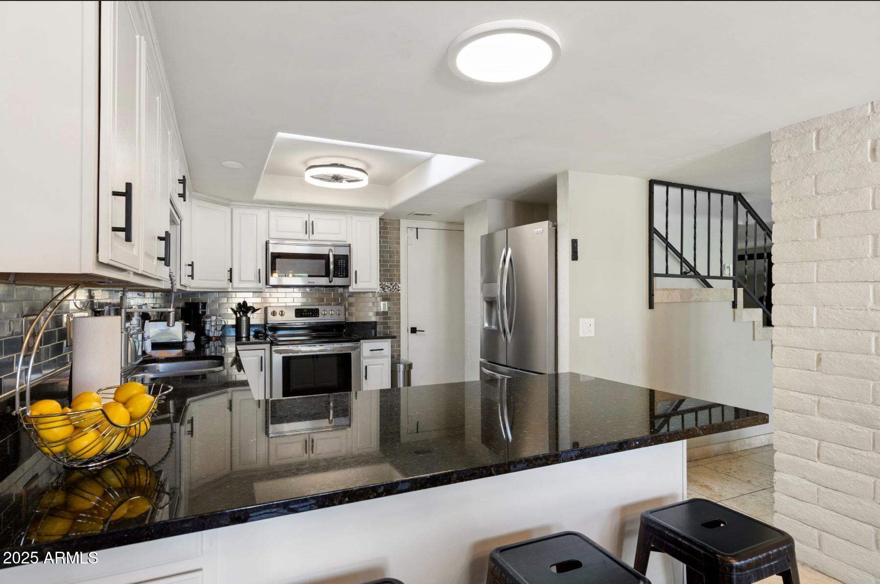 7802 E MACKENZIE Drive