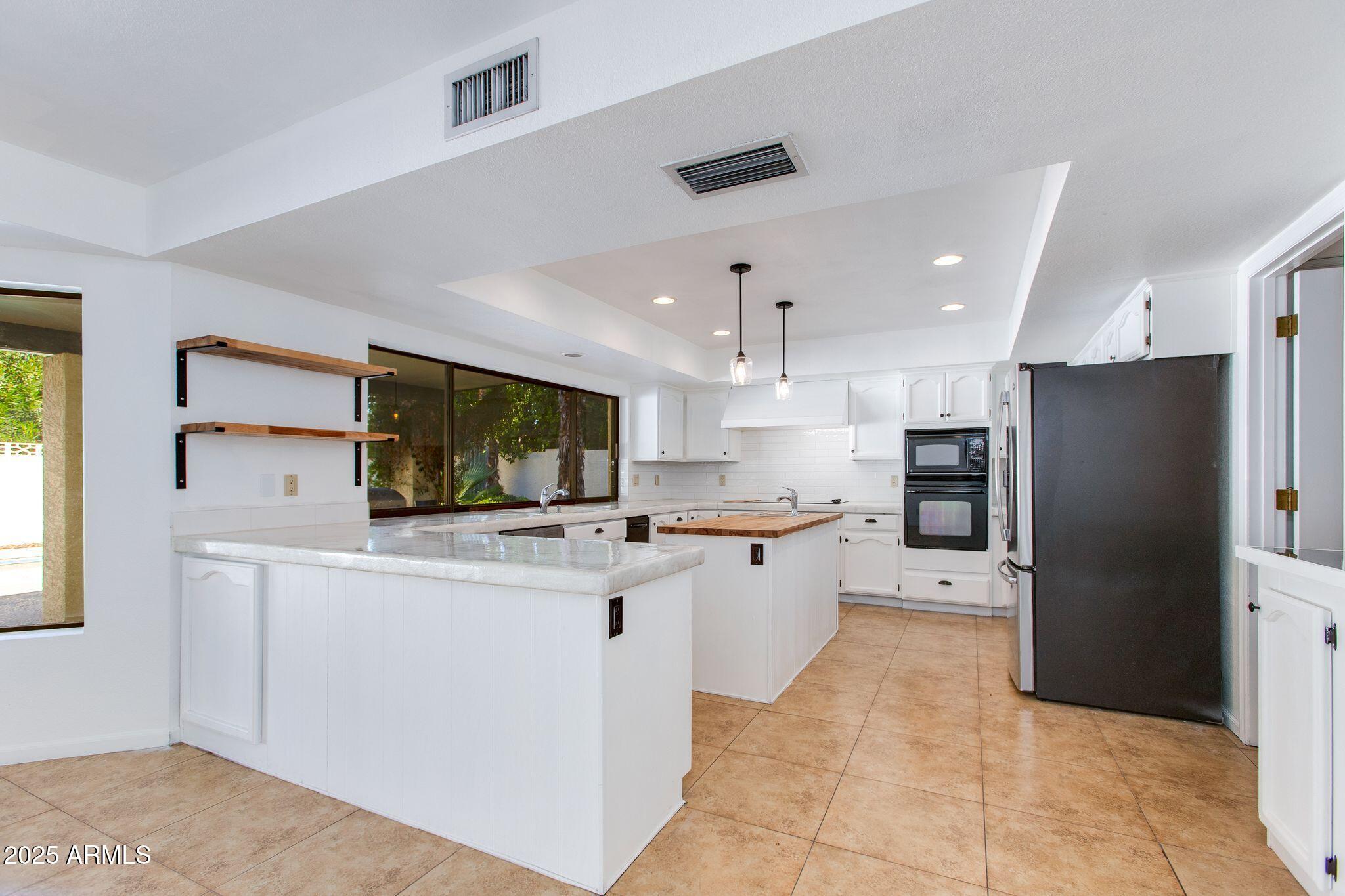8614 E CHERYL Drive