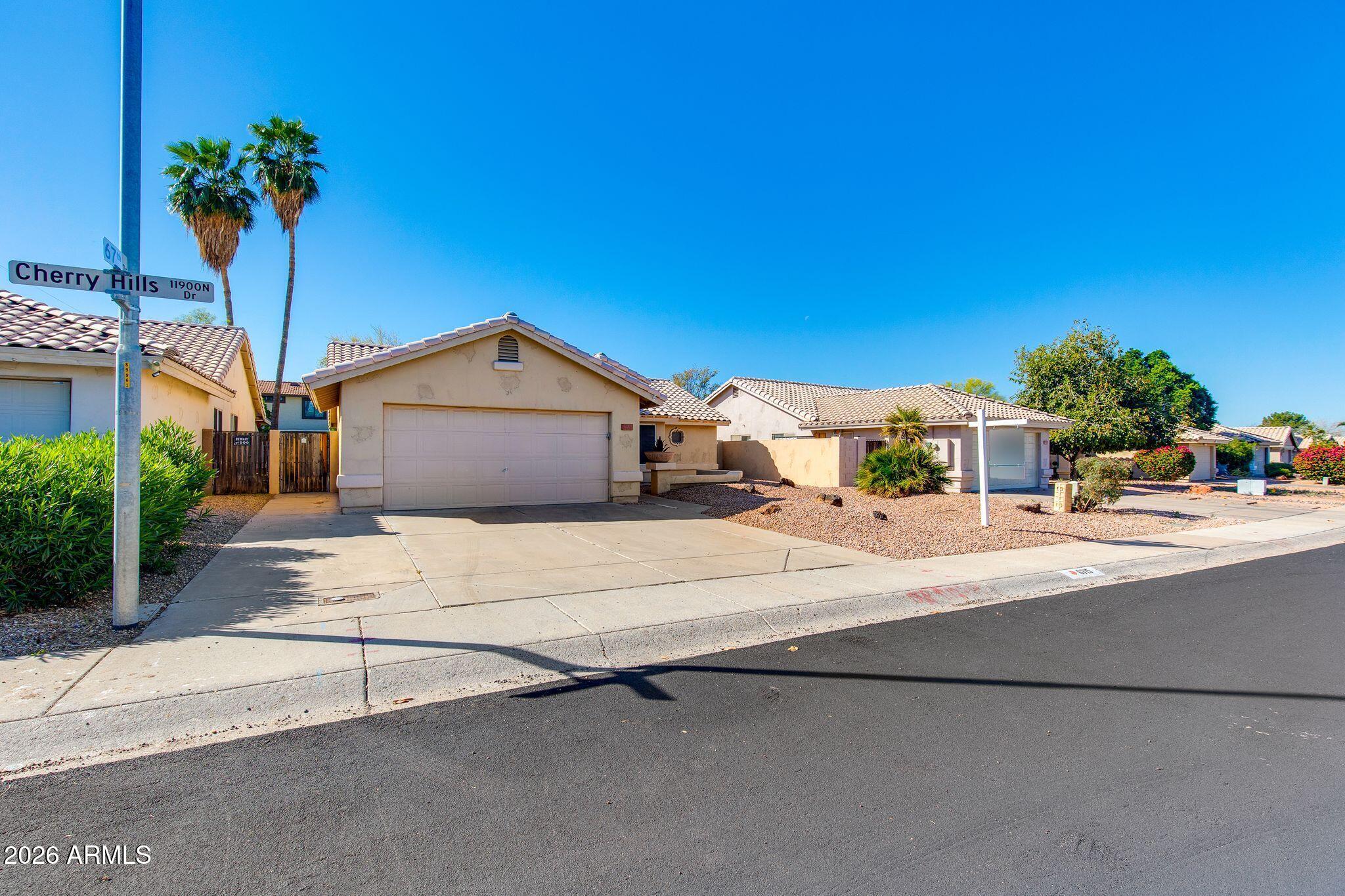 6715 W CHERRY HILLS Drive