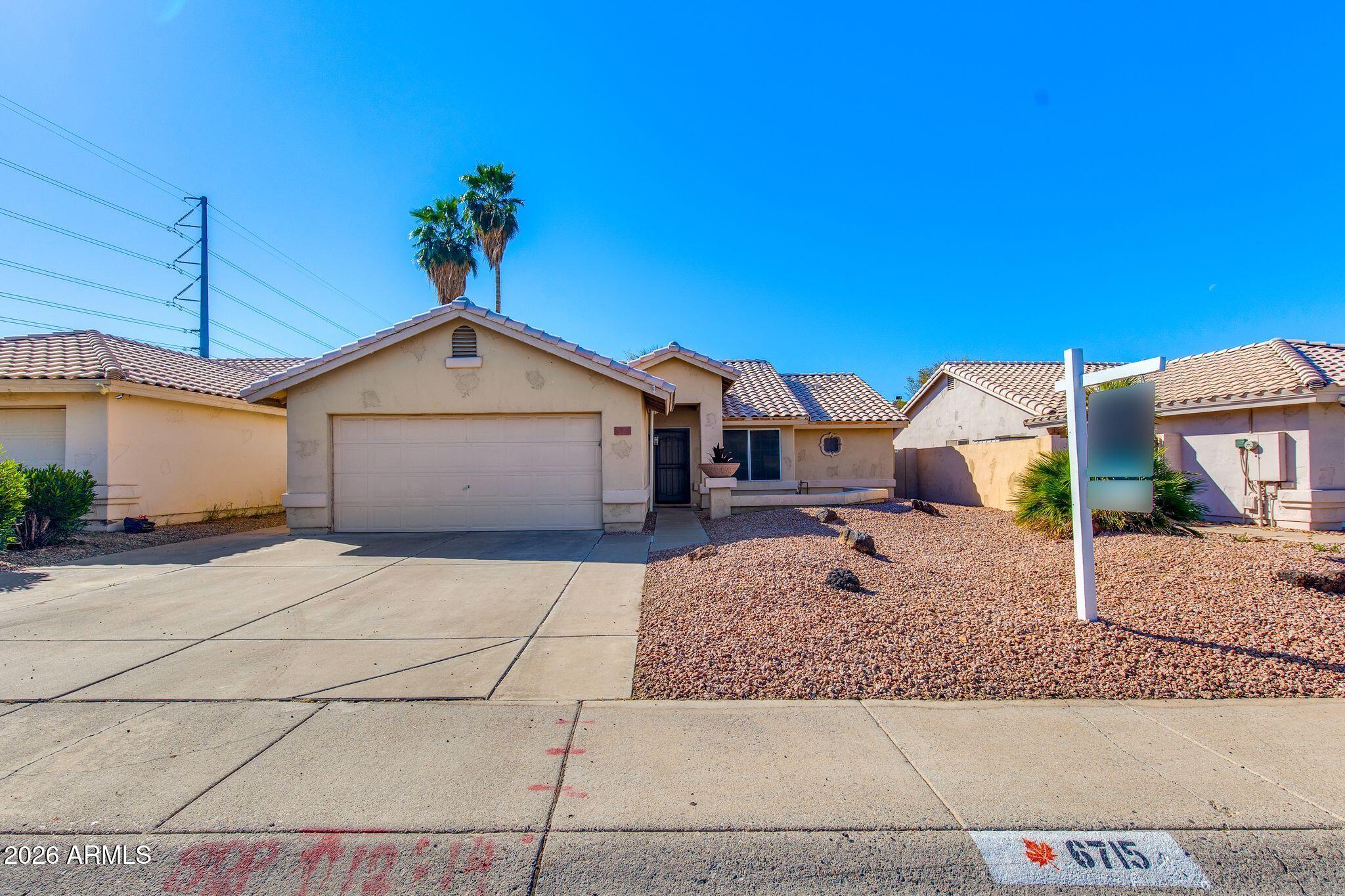 6715 W CHERRY HILLS Drive