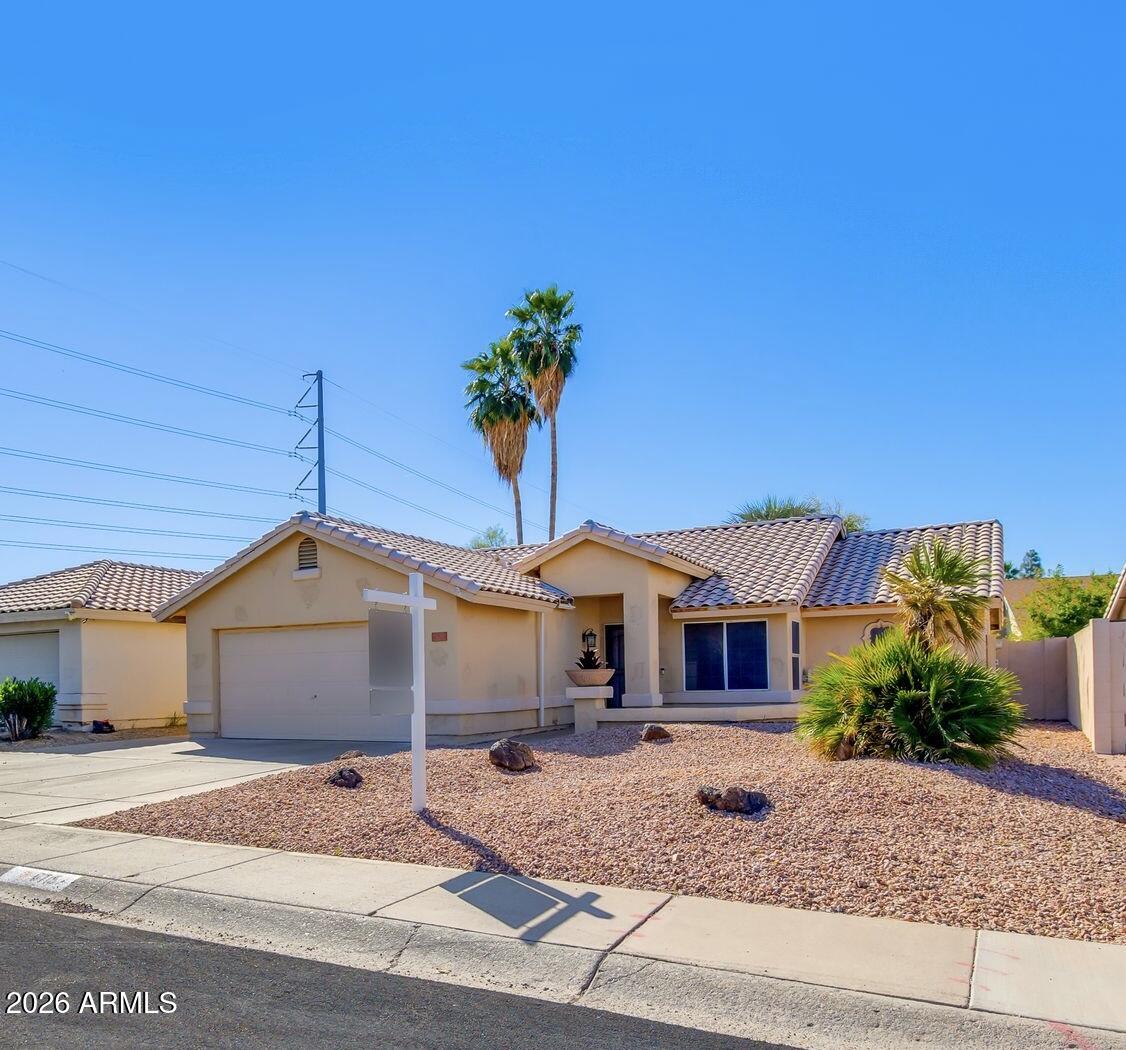 6715 W CHERRY HILLS Drive