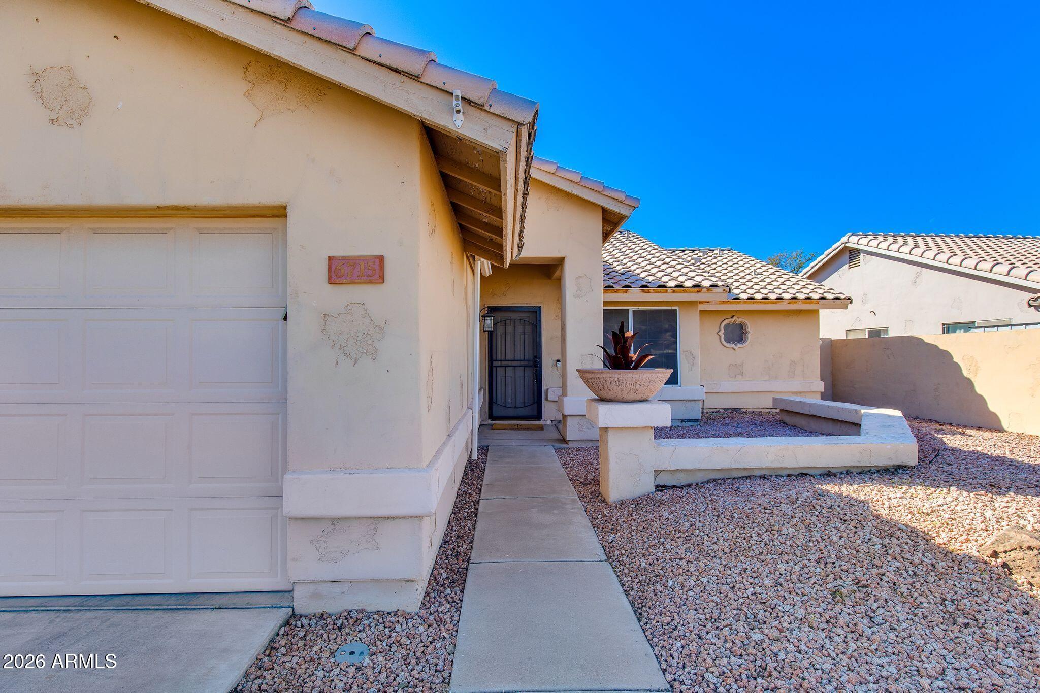 6715 W CHERRY HILLS Drive