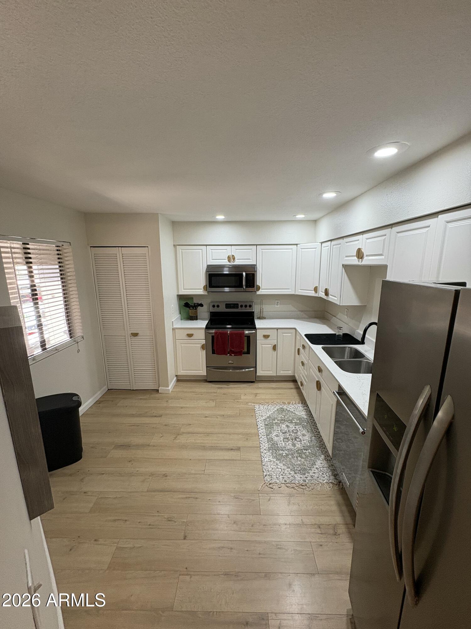 9450 N 94TH Place 214