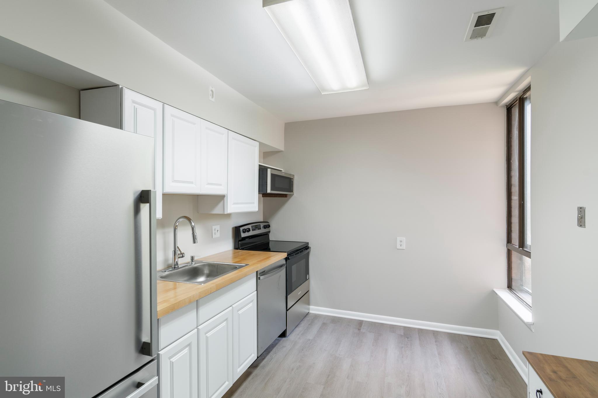 6711 Park Heights Ave #211