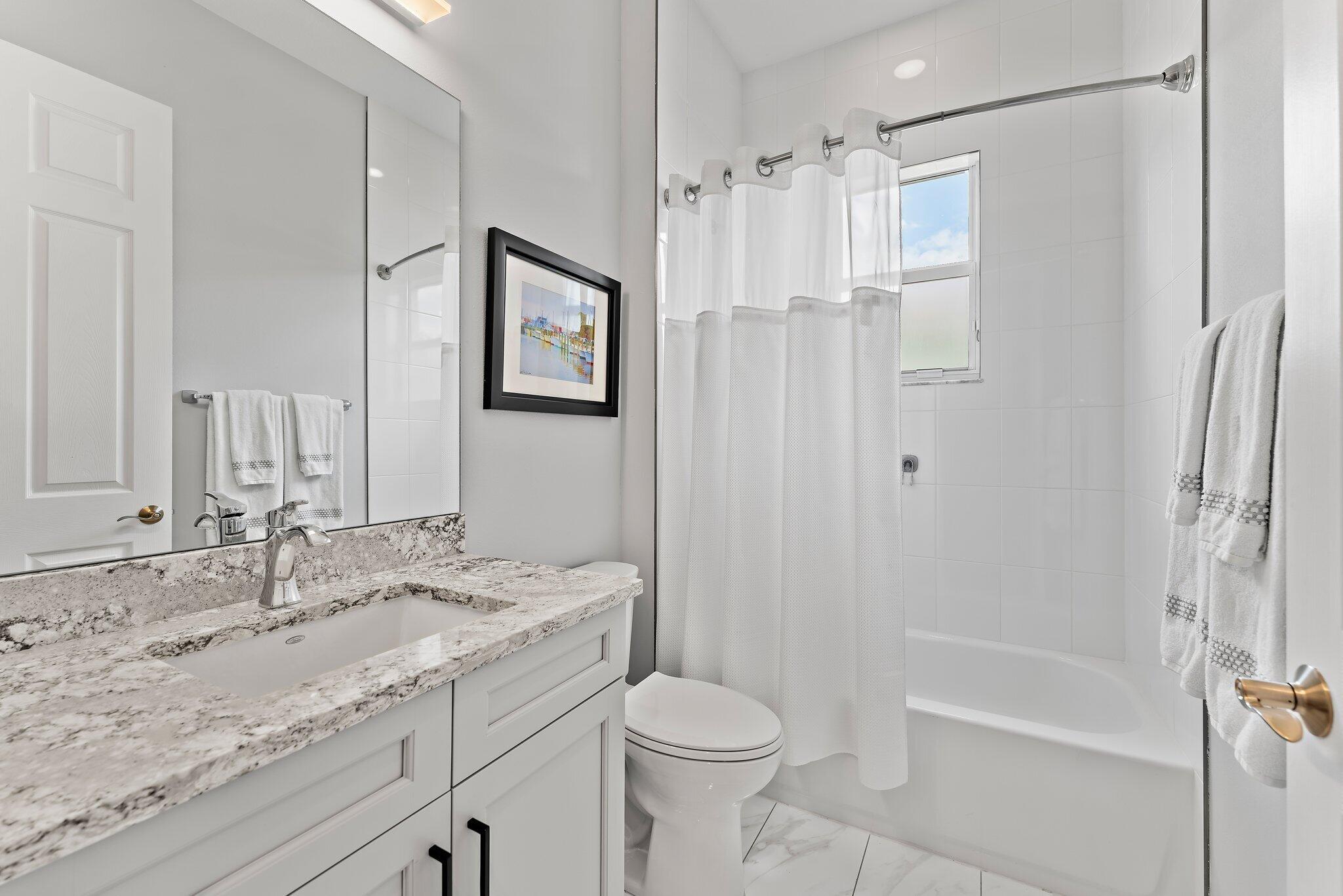 9306 SW Miracoli Way