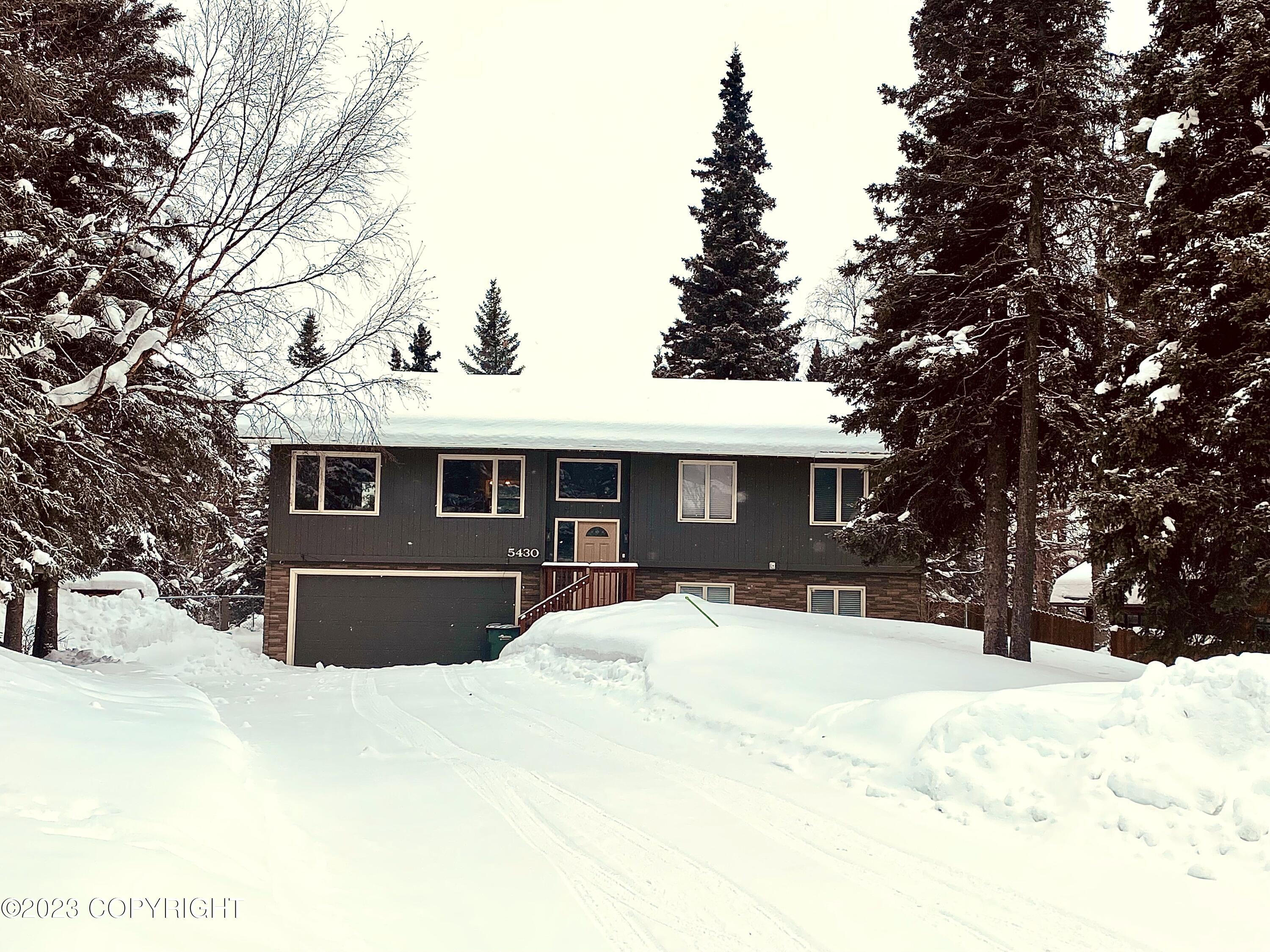 5430 Whispering Spruce Drive