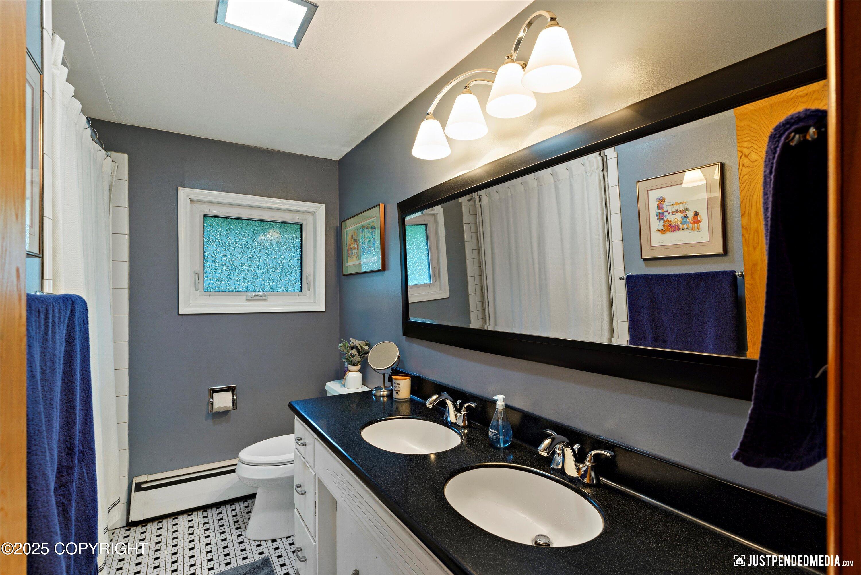 7243 Old Harbor Avenue