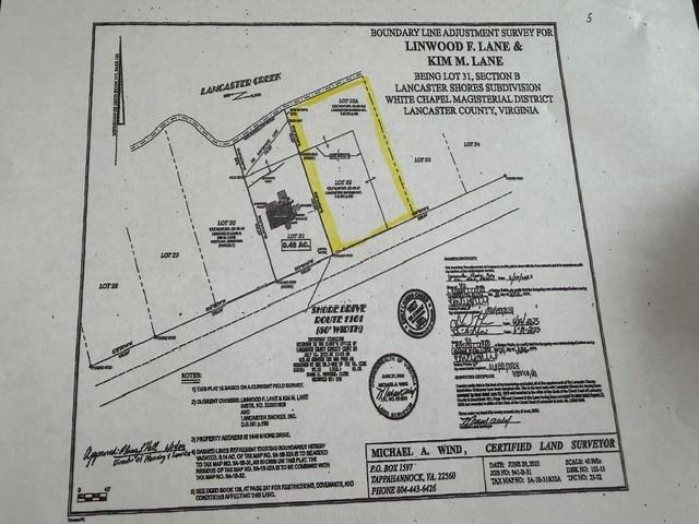 Boundary survey plat for Linwood and Kim Lane, showing a yellow-highlighted parcel beside Lancaster Creek.