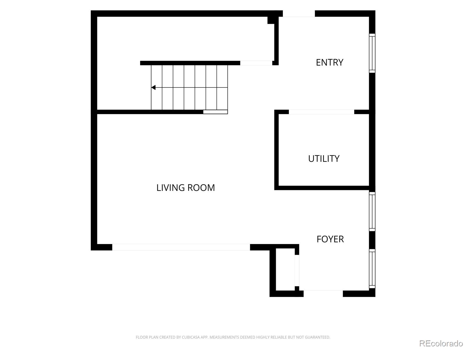 Floor plan showing the entry, utility room, living room, foyer, and staircase.