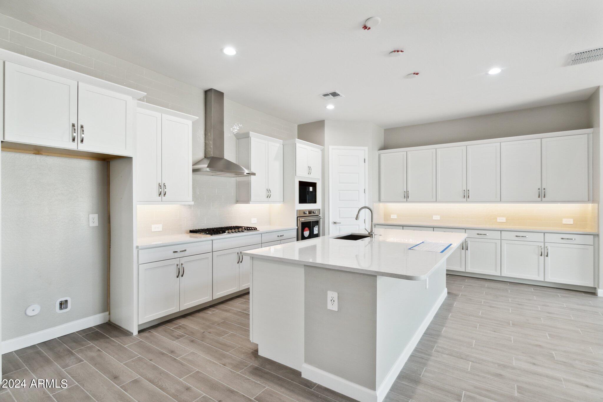 10348 W QUAIL Avenue