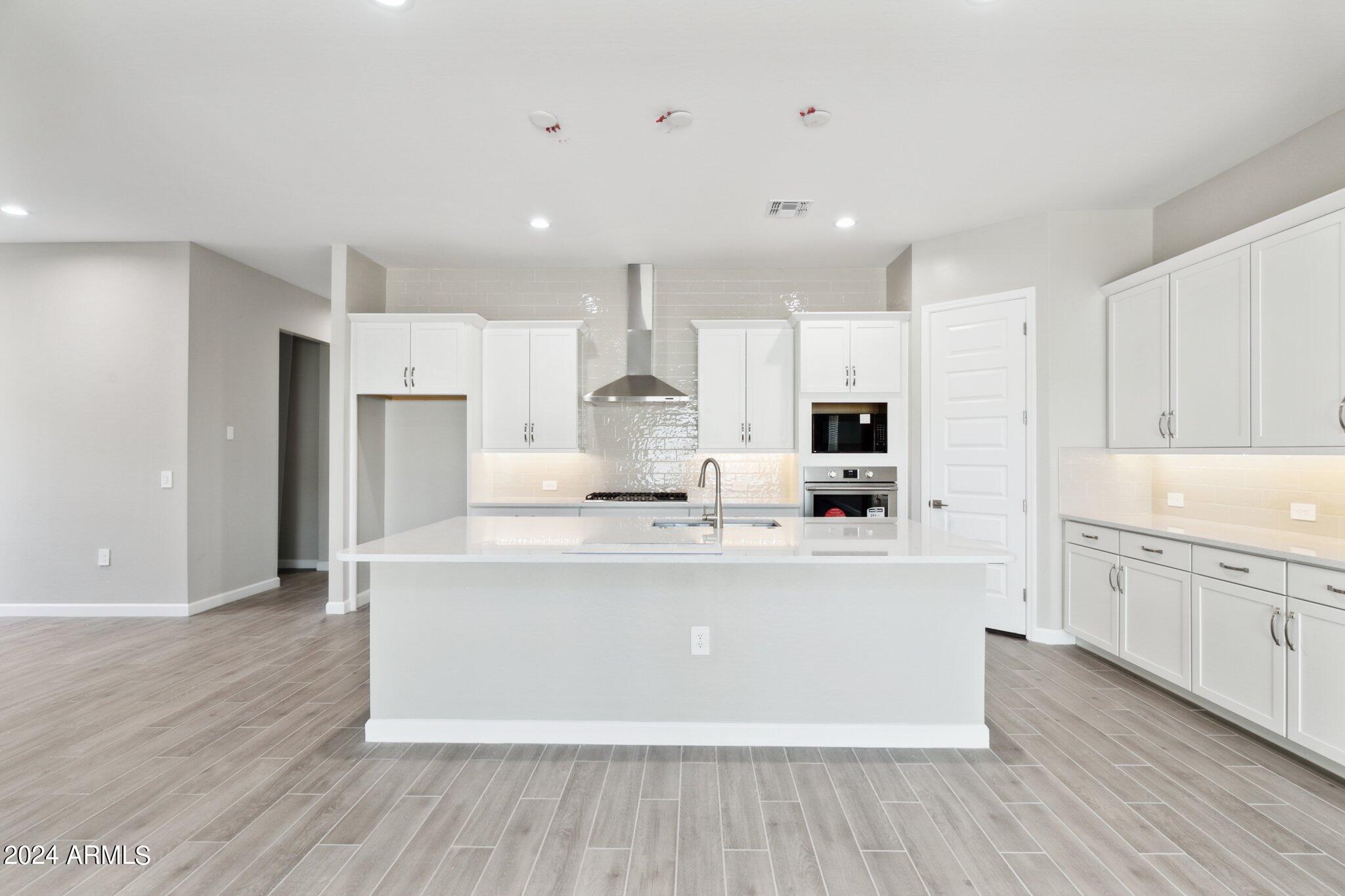 10348 W QUAIL Avenue