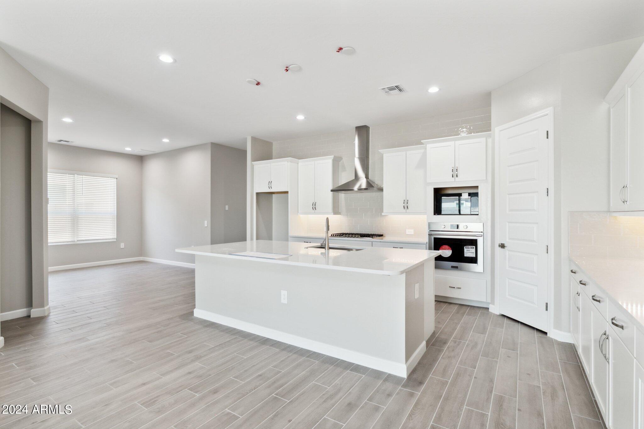 10348 W QUAIL Avenue