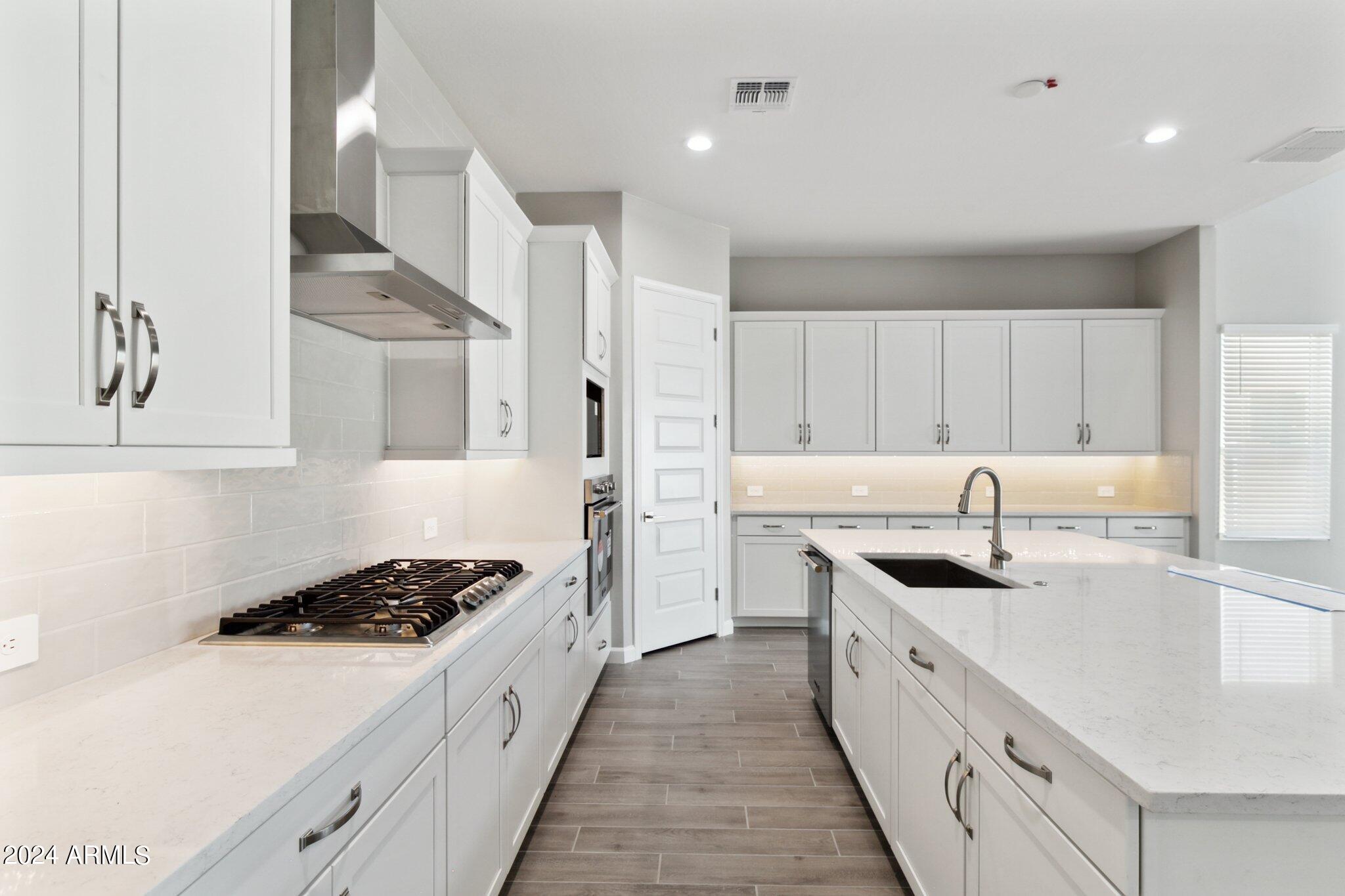 10348 W QUAIL Avenue