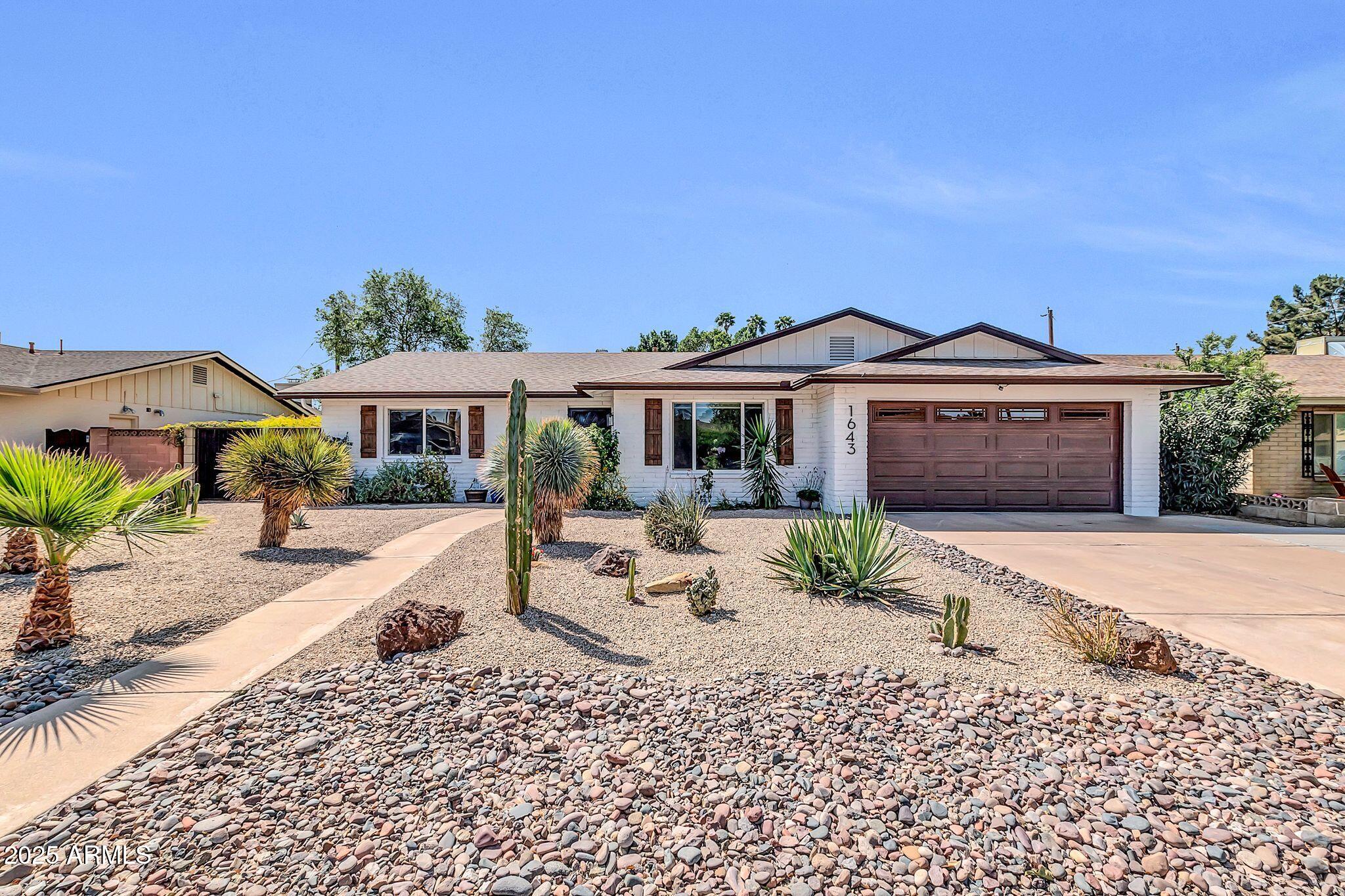 1643 W HARMONT Drive