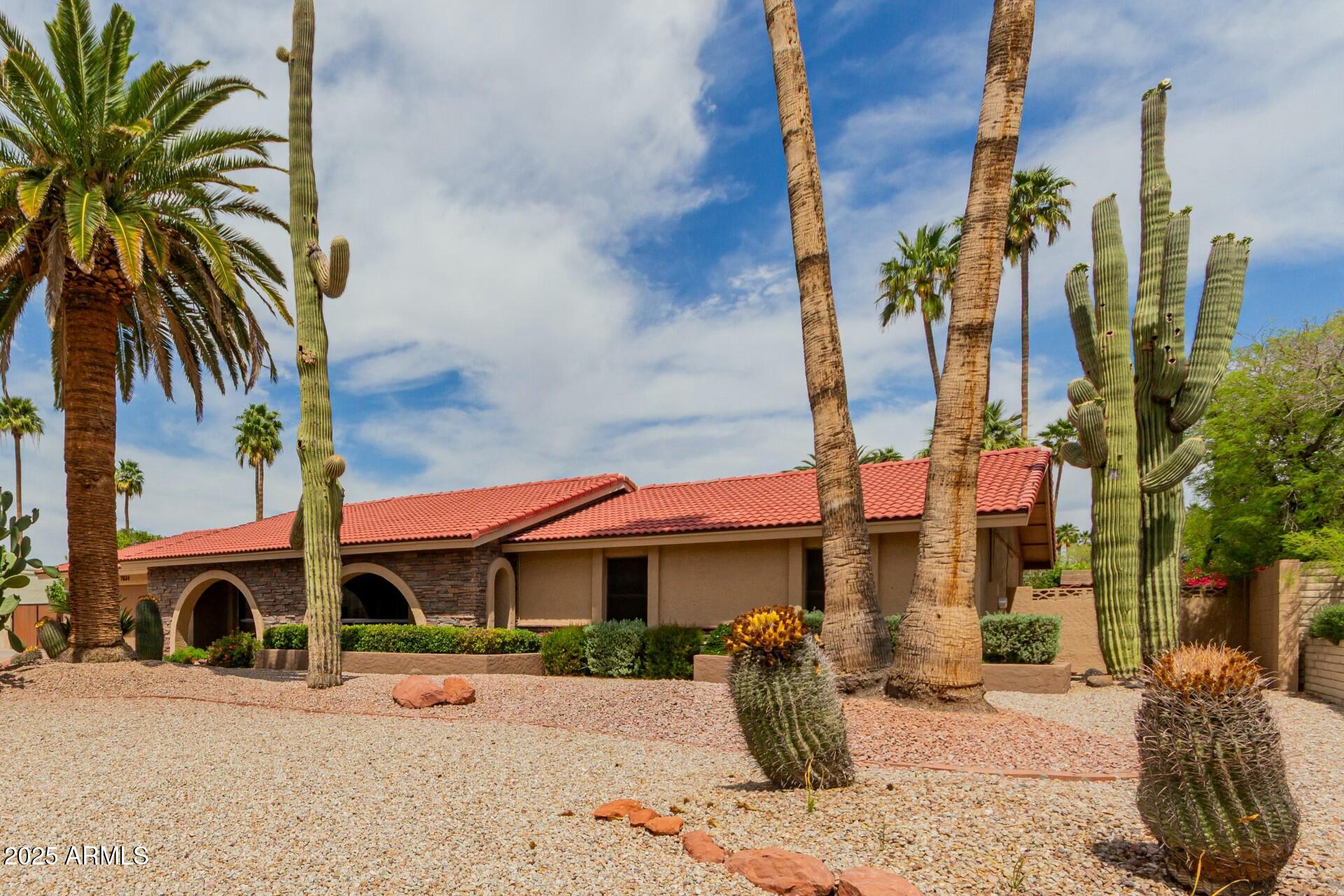 7634 W BLUEFIELD Avenue