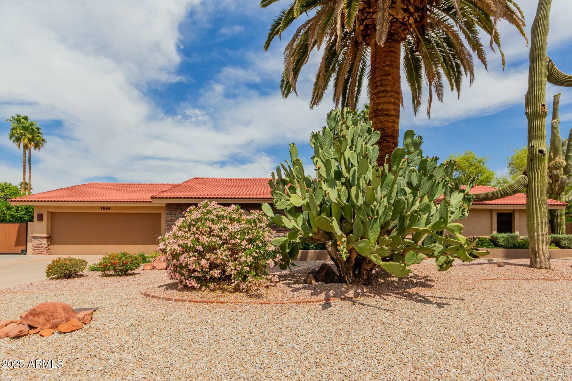 7634 W BLUEFIELD Avenue