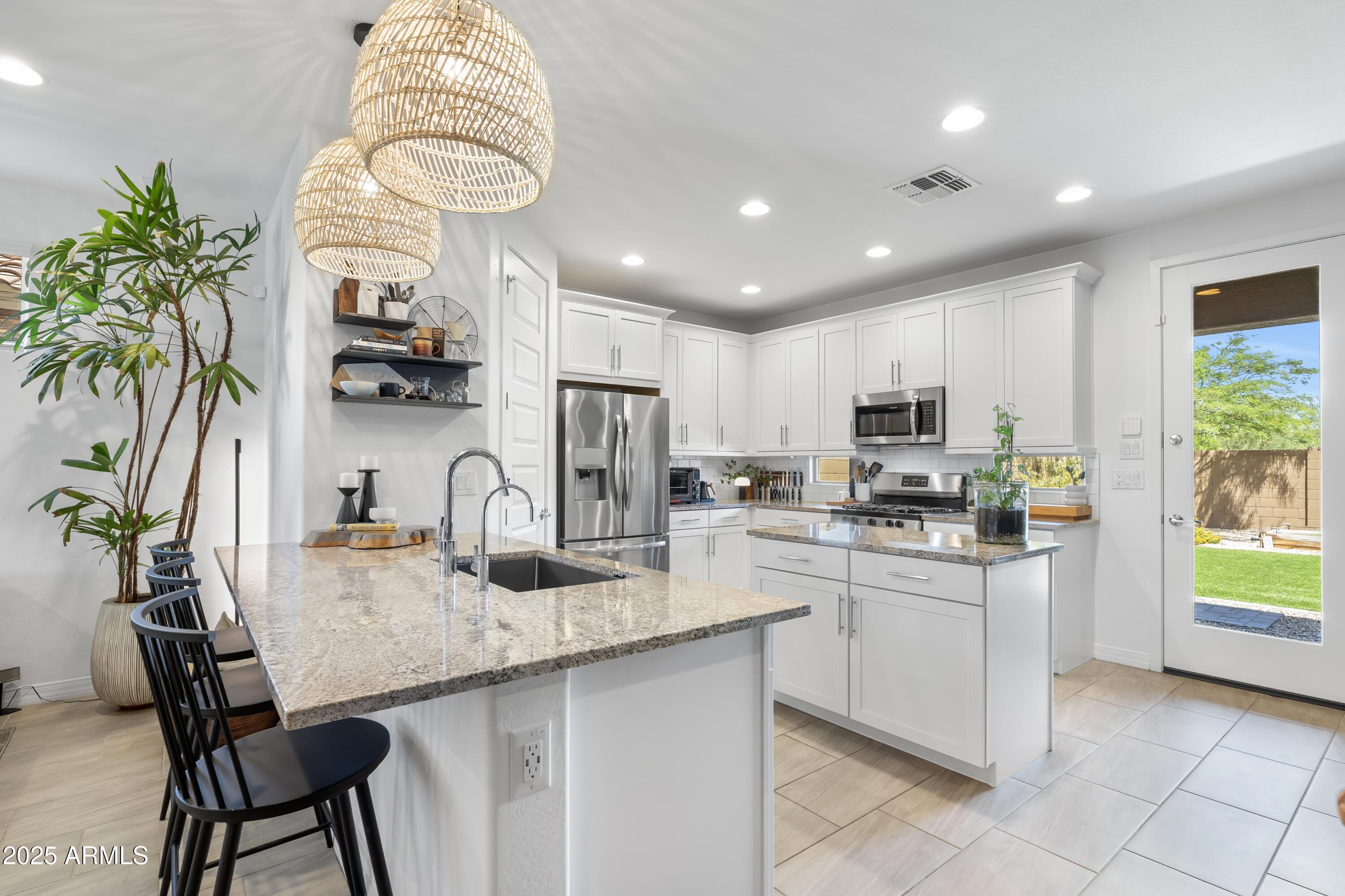 6338 W RAYMOND Street