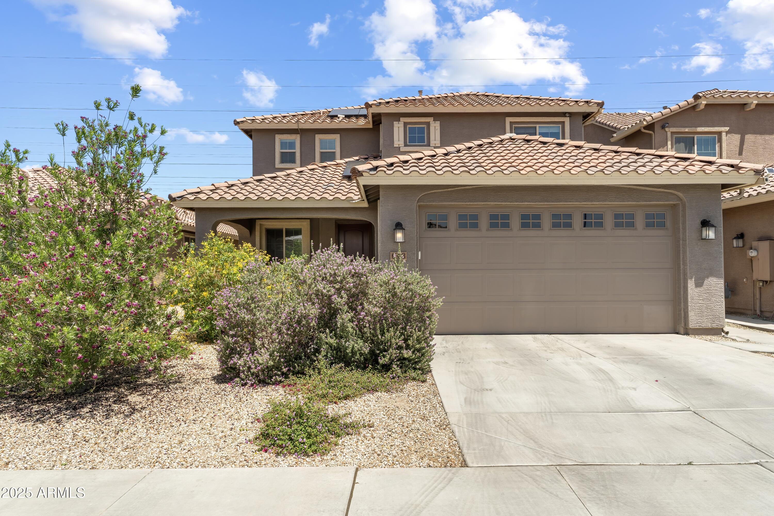 6338 W RAYMOND Street