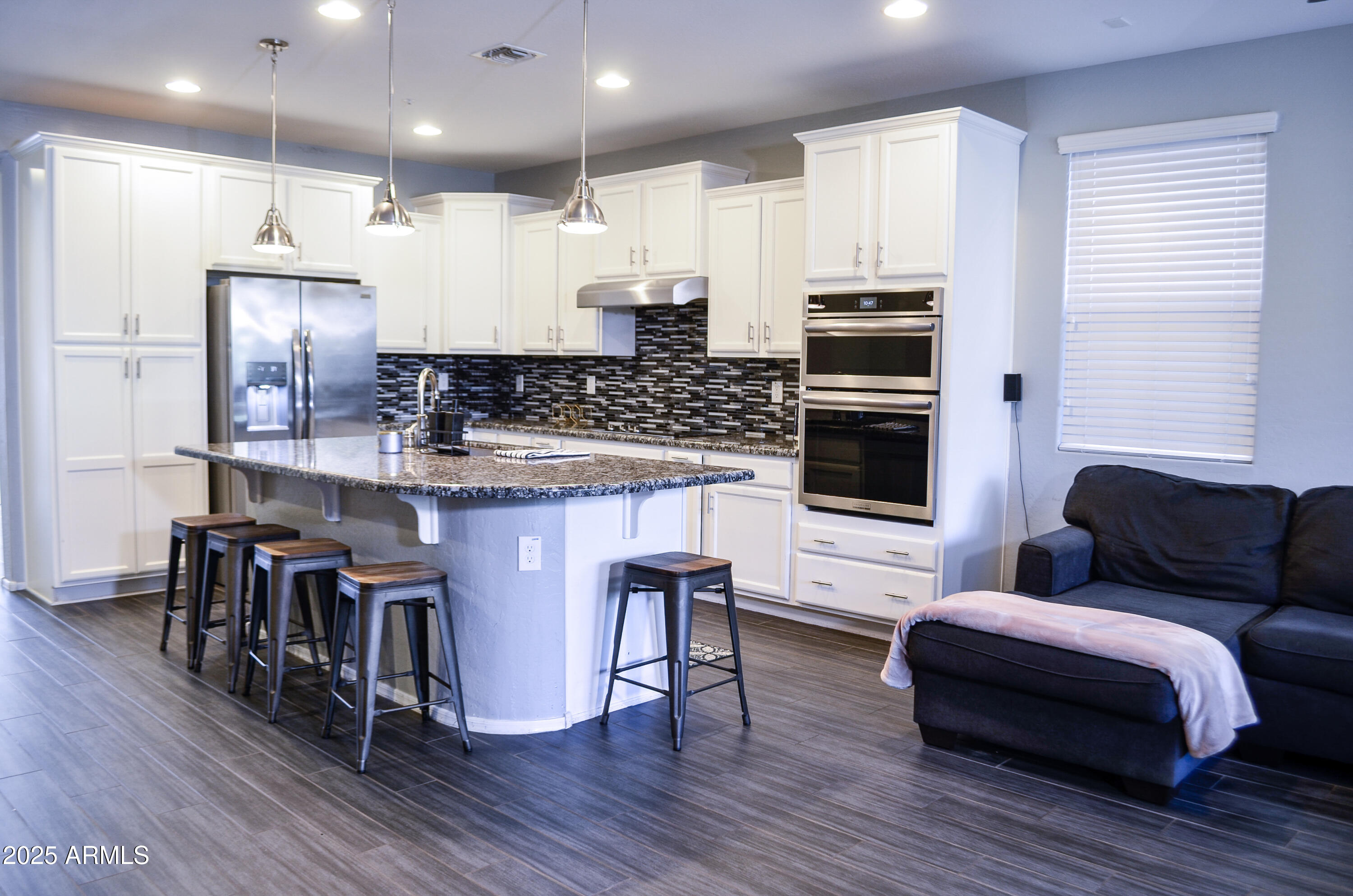 12812 W CARAVEO Place