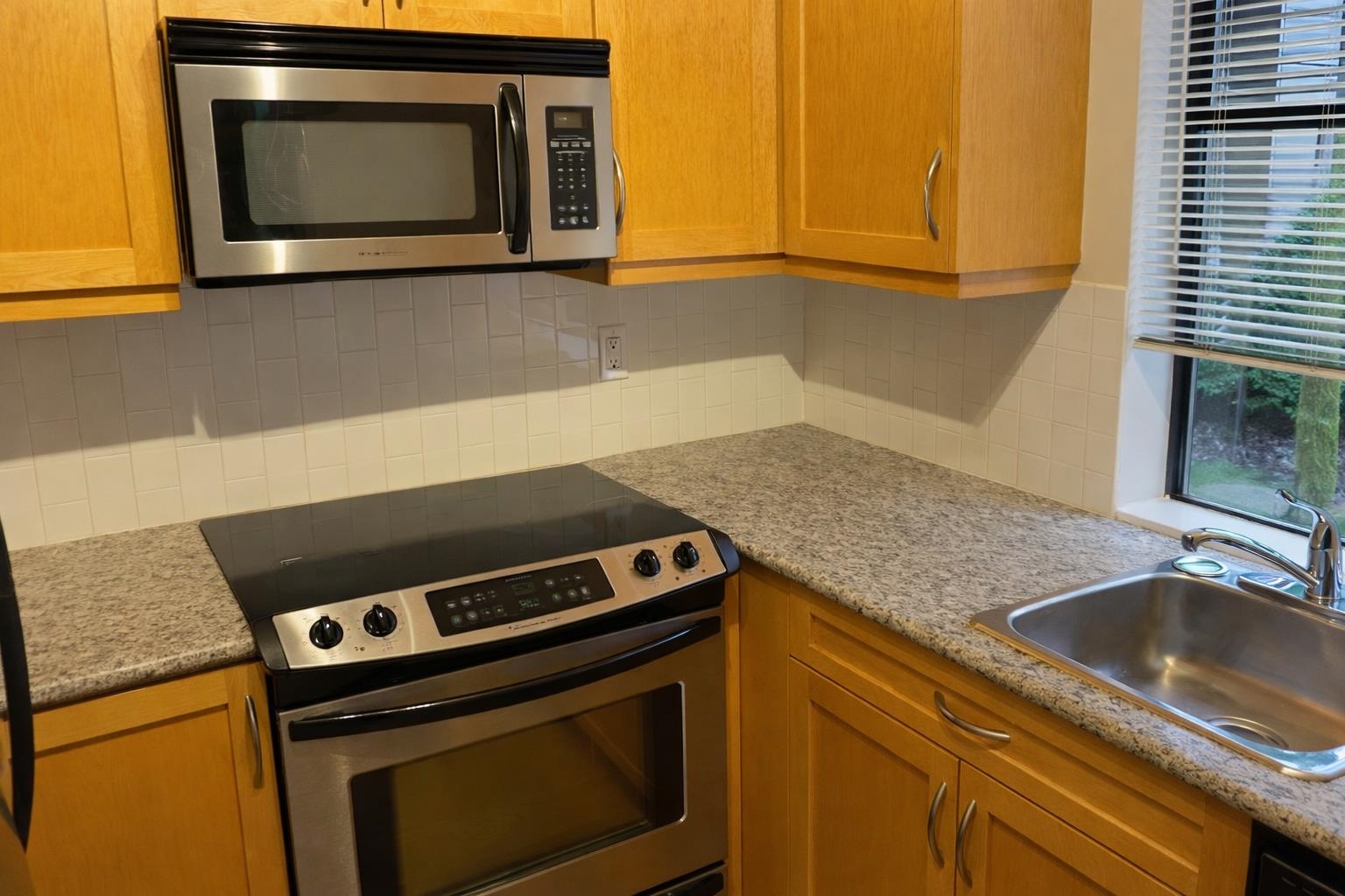 105 8460 ACKROYD ROAD Unit: 105