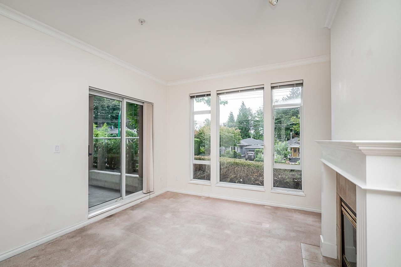 207 678 W QUEENS ROAD