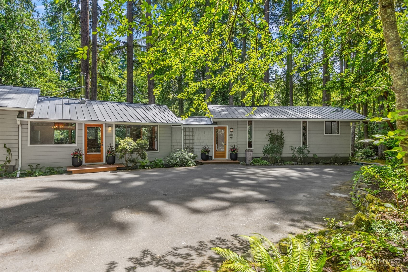 6565 NE Island Center Rd.