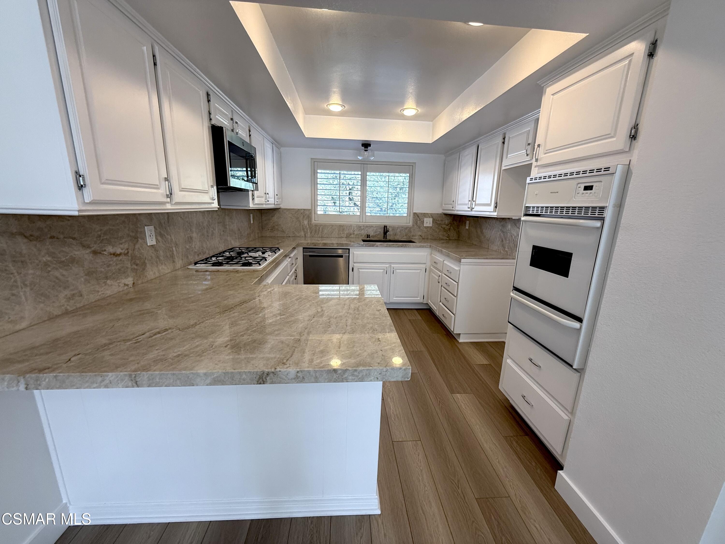 21801 Burbank Boulevard, 77