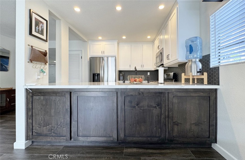 4682 Warner Avenue B107