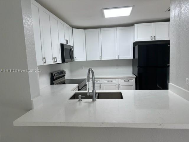 12251 SW 221 St