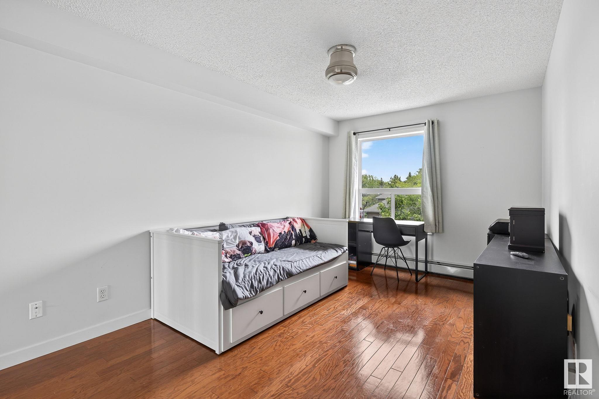#410 10951 124 ST NW