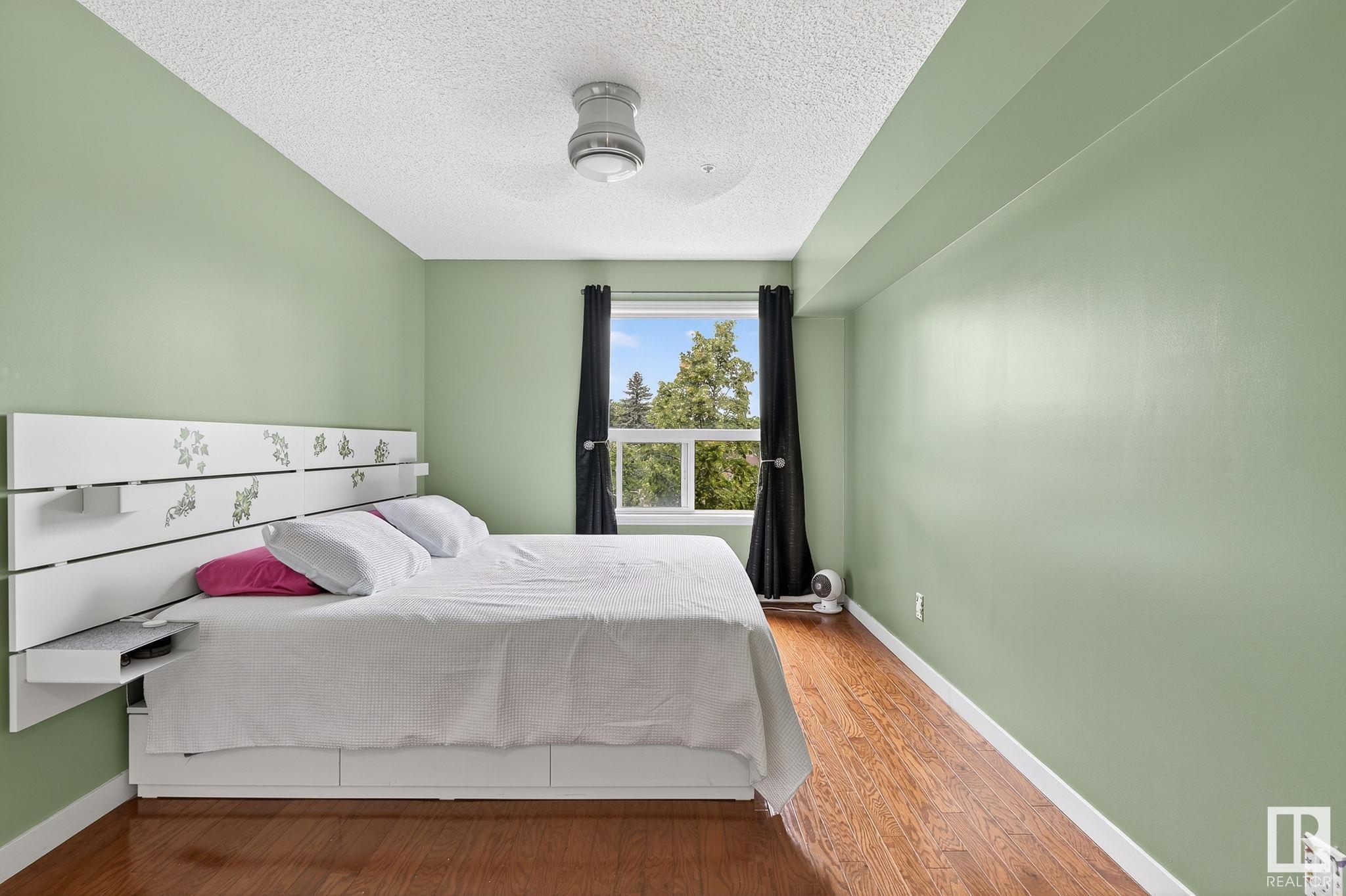 #410 10951 124 ST NW