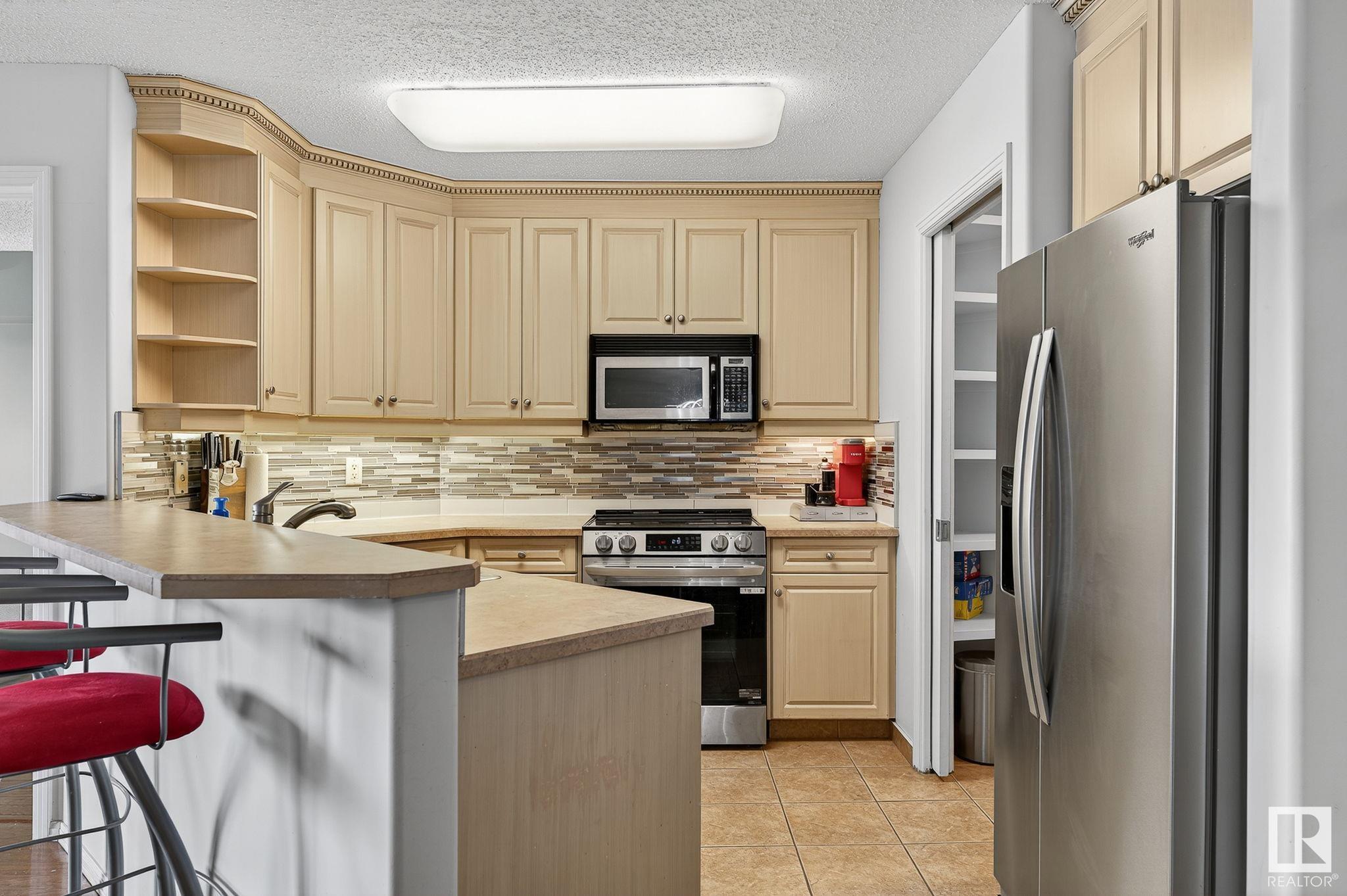 #410 10951 124 ST NW