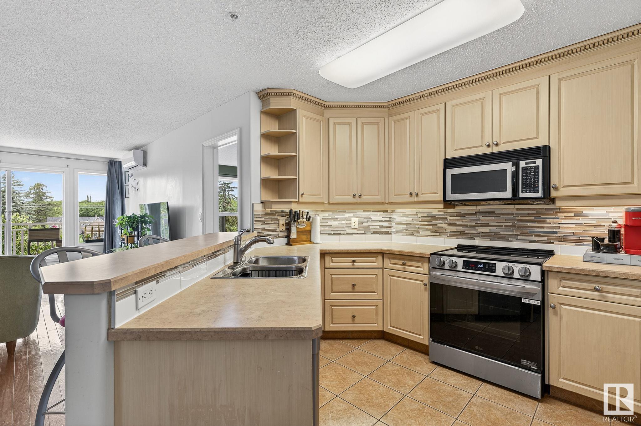 #410 10951 124 ST NW