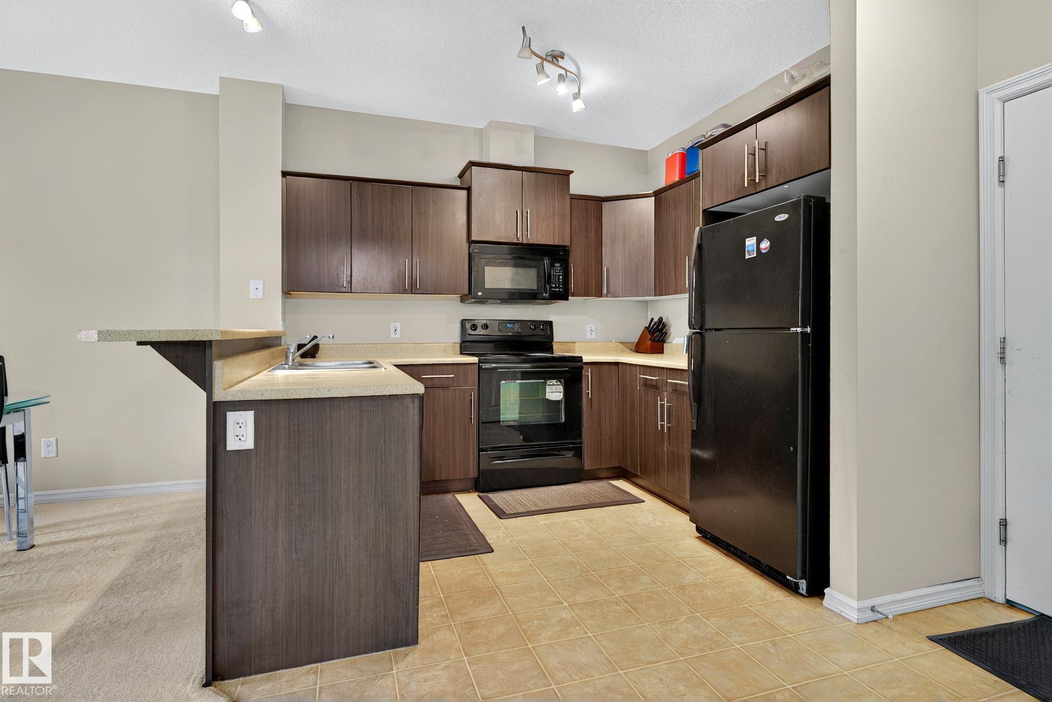 #104 263 MACEWAN RD SW