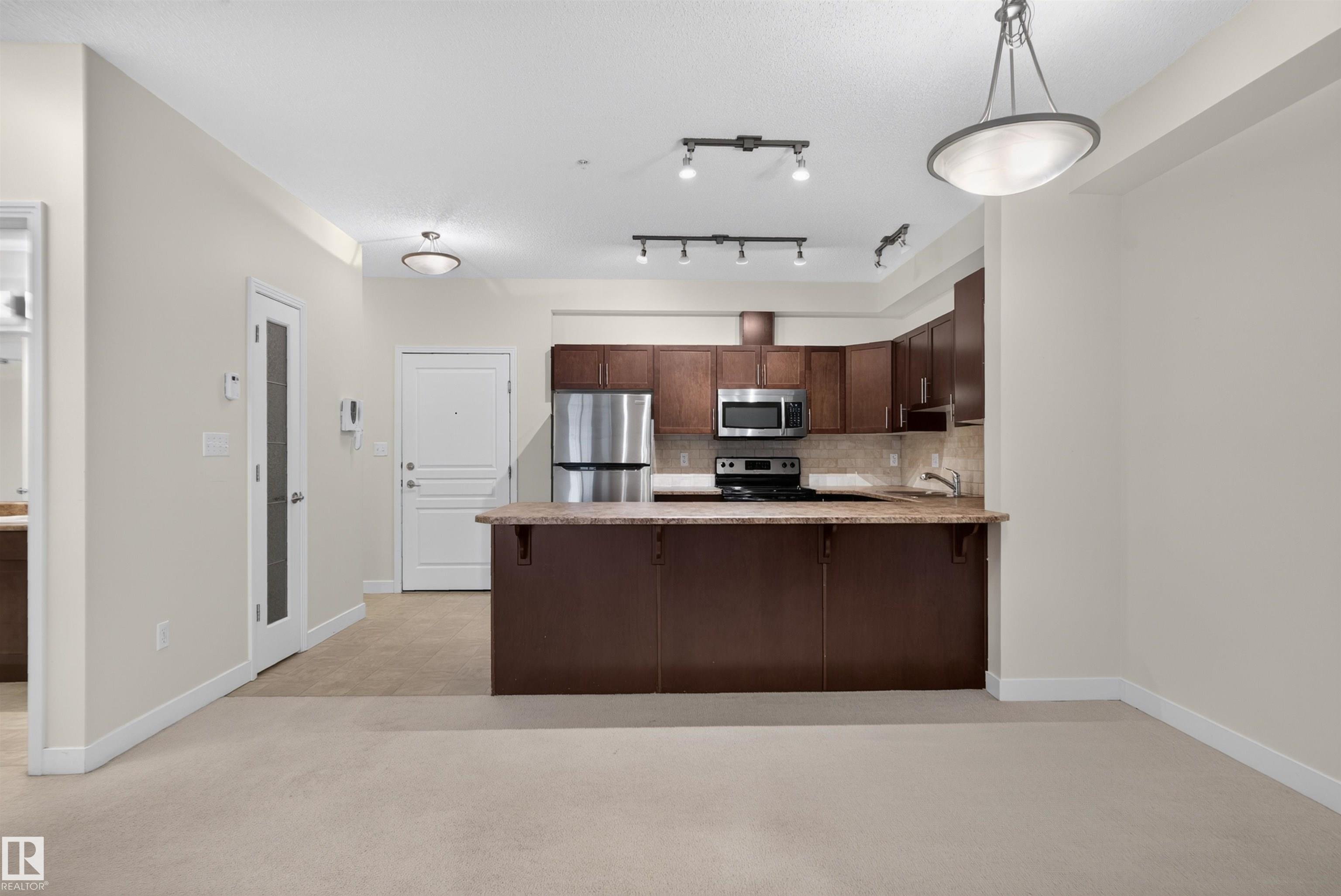 #212 2035 GRANTHAM CT NW
