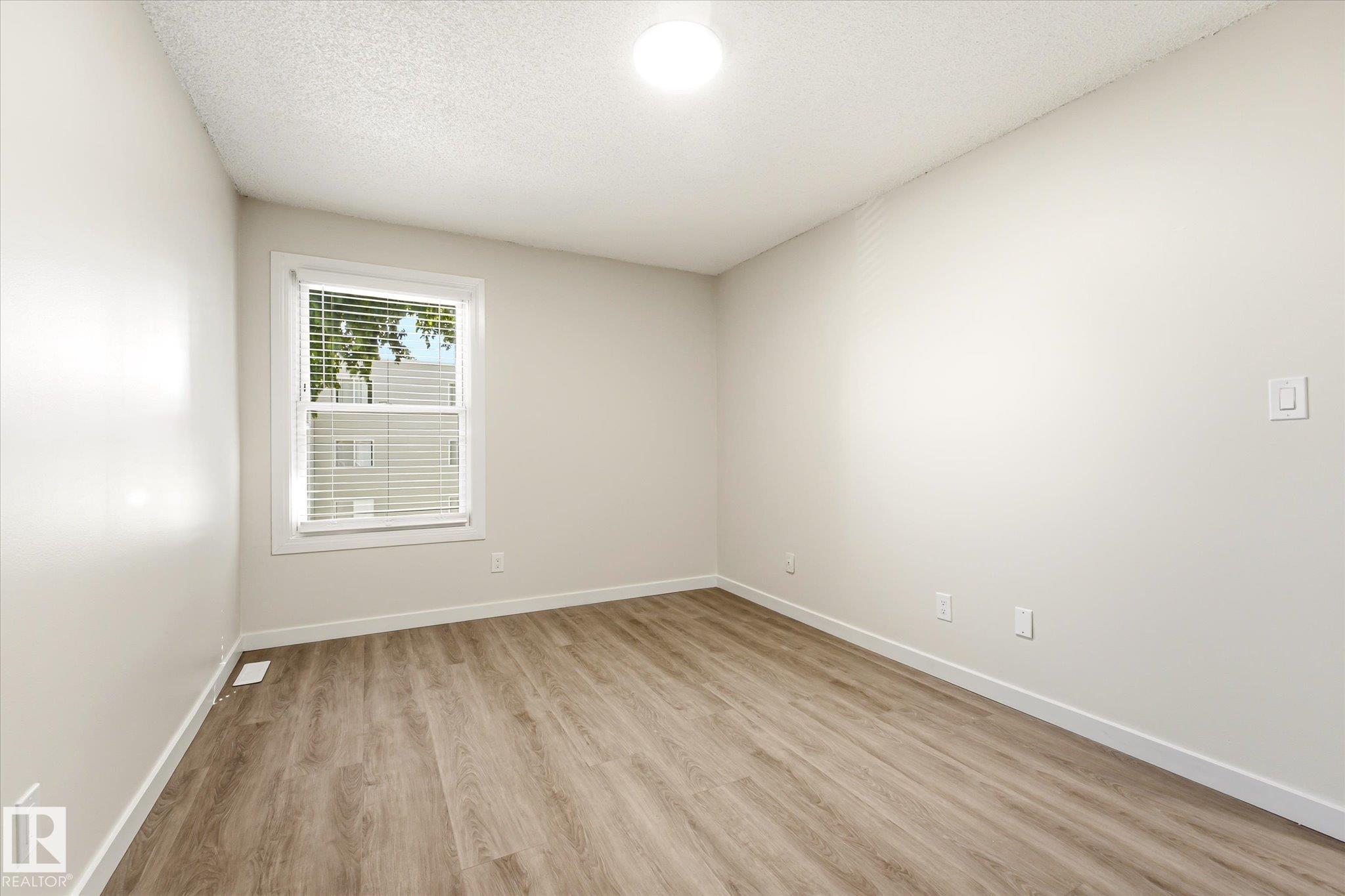 18439 66 AV NW