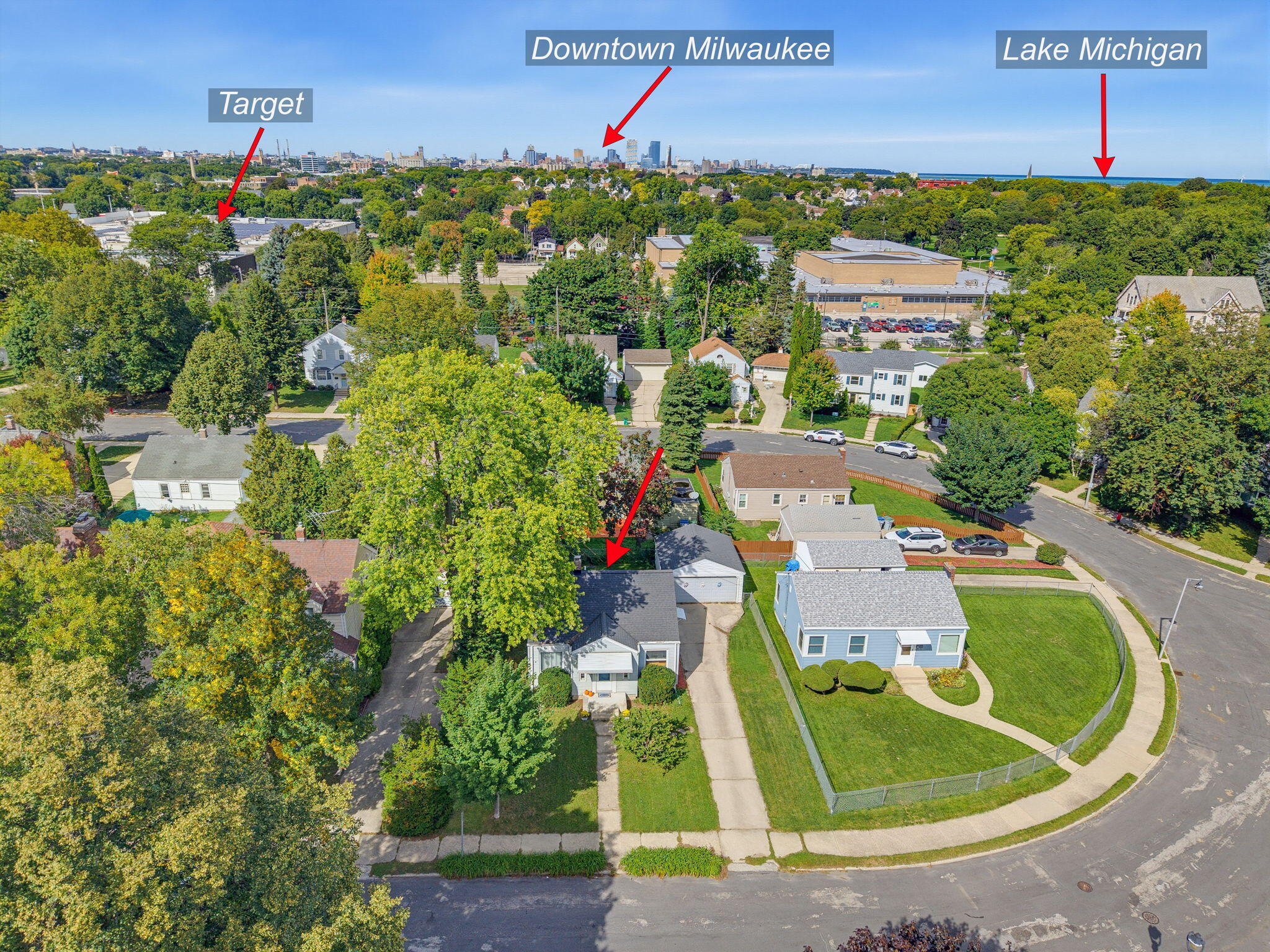 Aerial view of a Milwaukee home, with arrows marking the property, downtown, Target, and Lake Michigan.