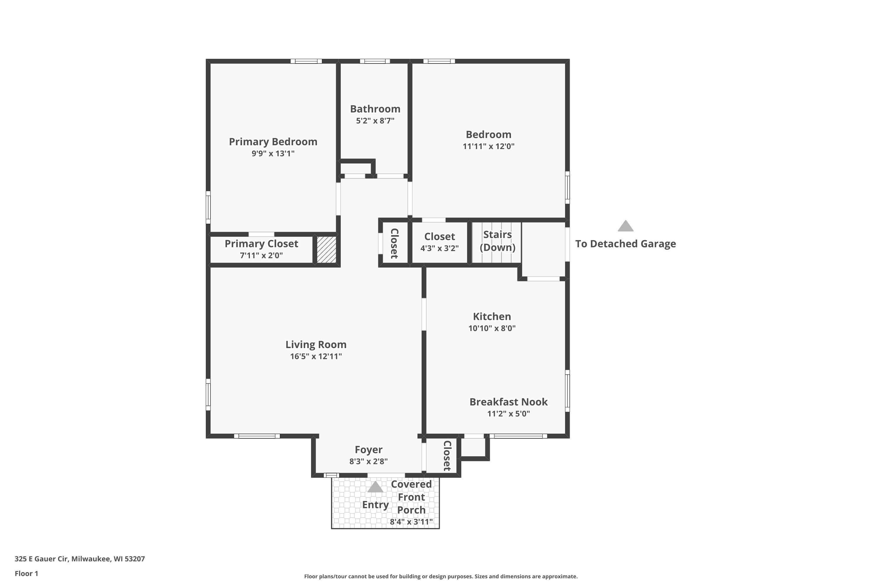 First-floor plan showing two bedrooms, living room, kitchen, breakfast nook, covered front porch, and detached garage access.