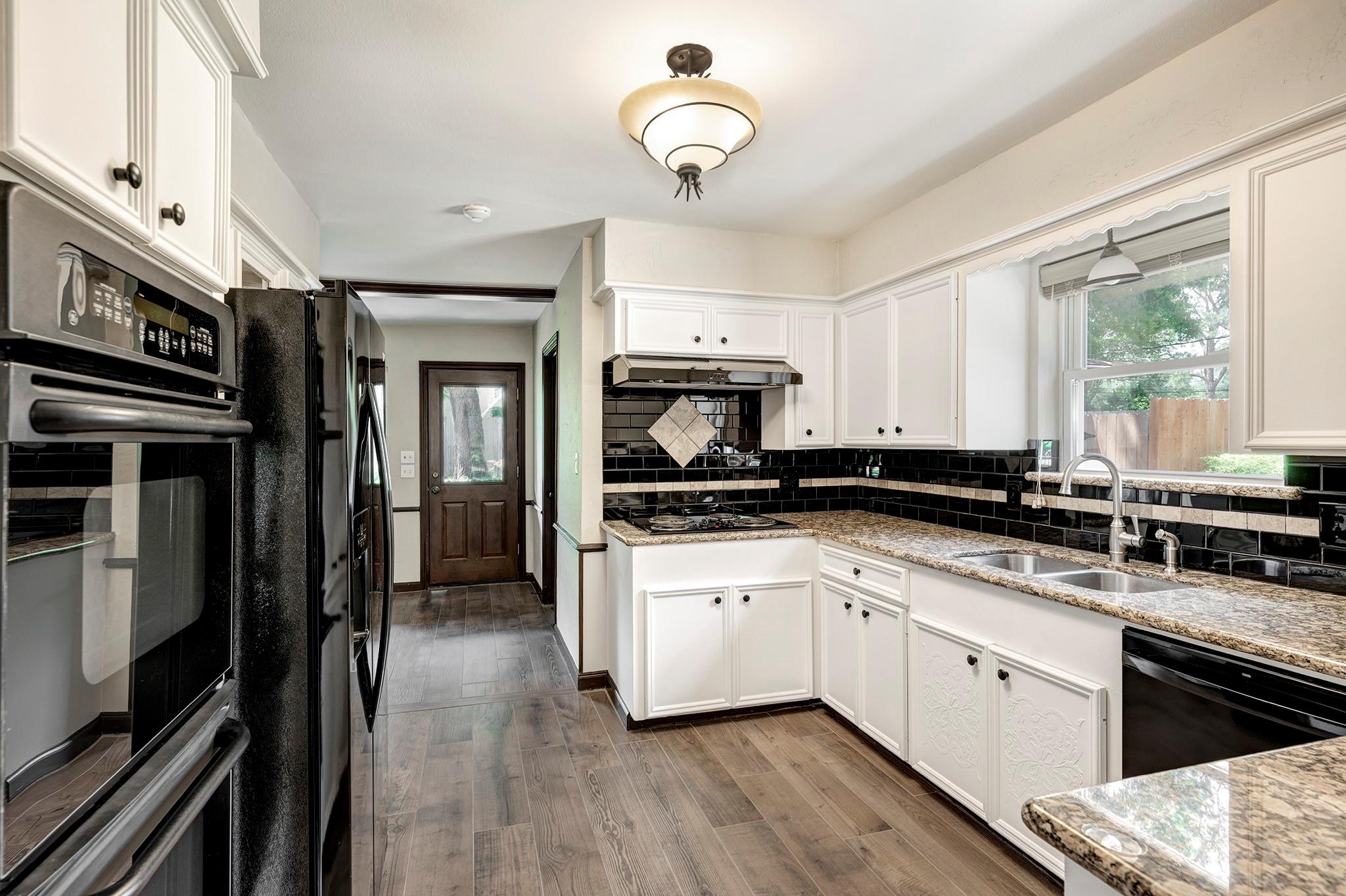 10727 Piping Rock Lane