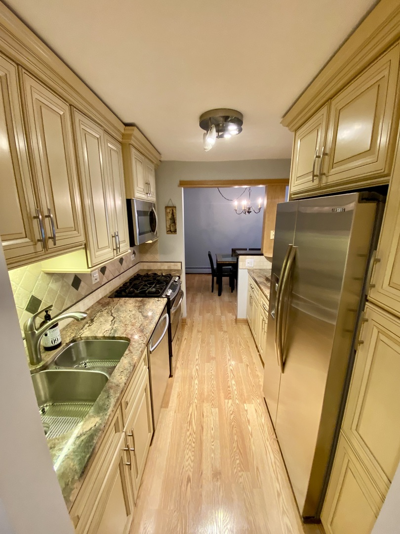 1126 S New Wilke Road Unit: 208