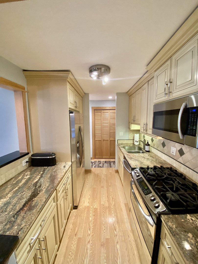 1126 S New Wilke Road Unit: 208