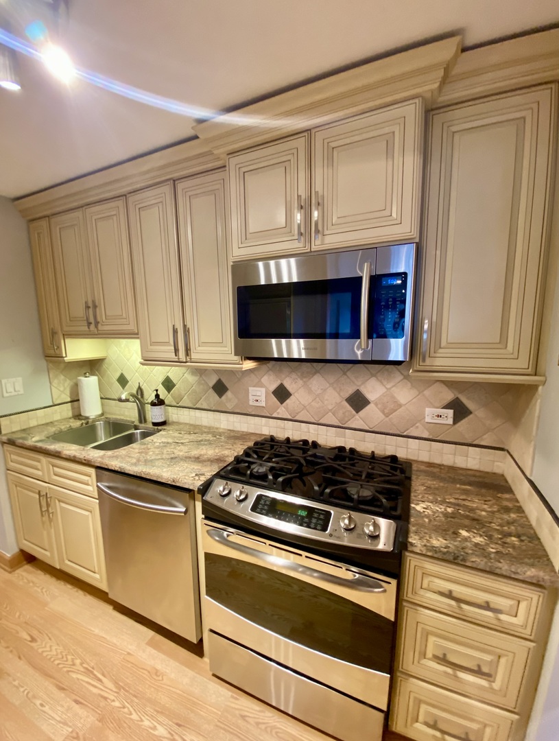 1126 S New Wilke Road Unit: 208