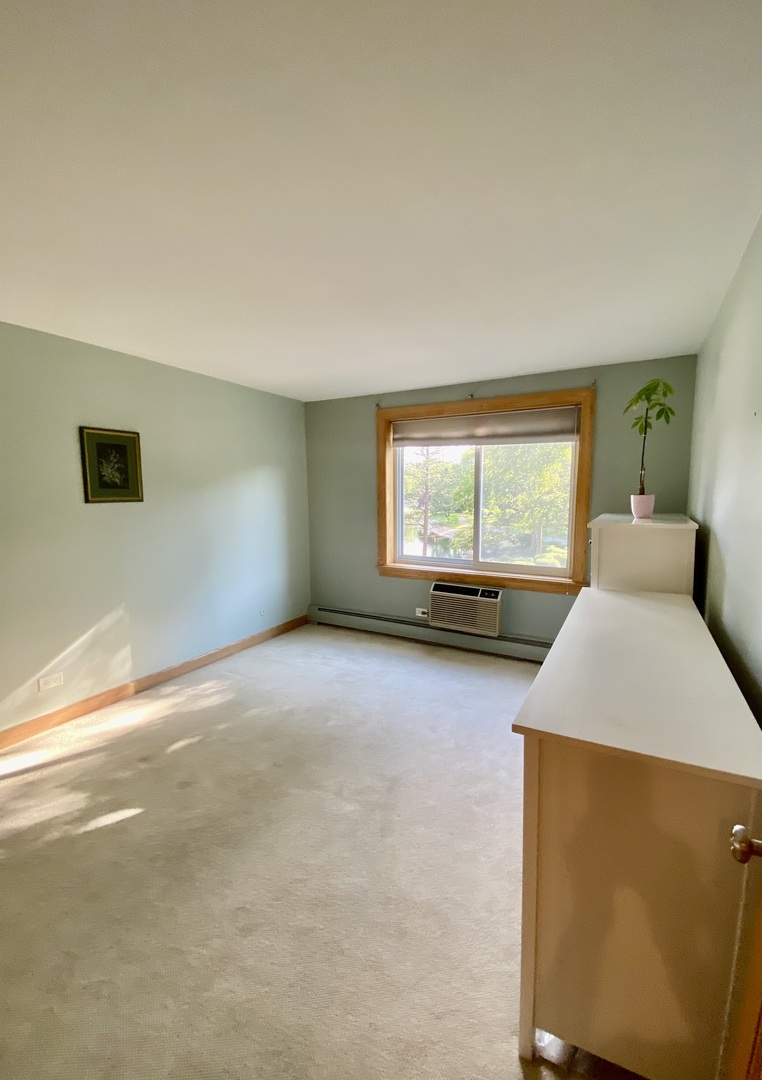 1126 S New Wilke Road Unit: 208