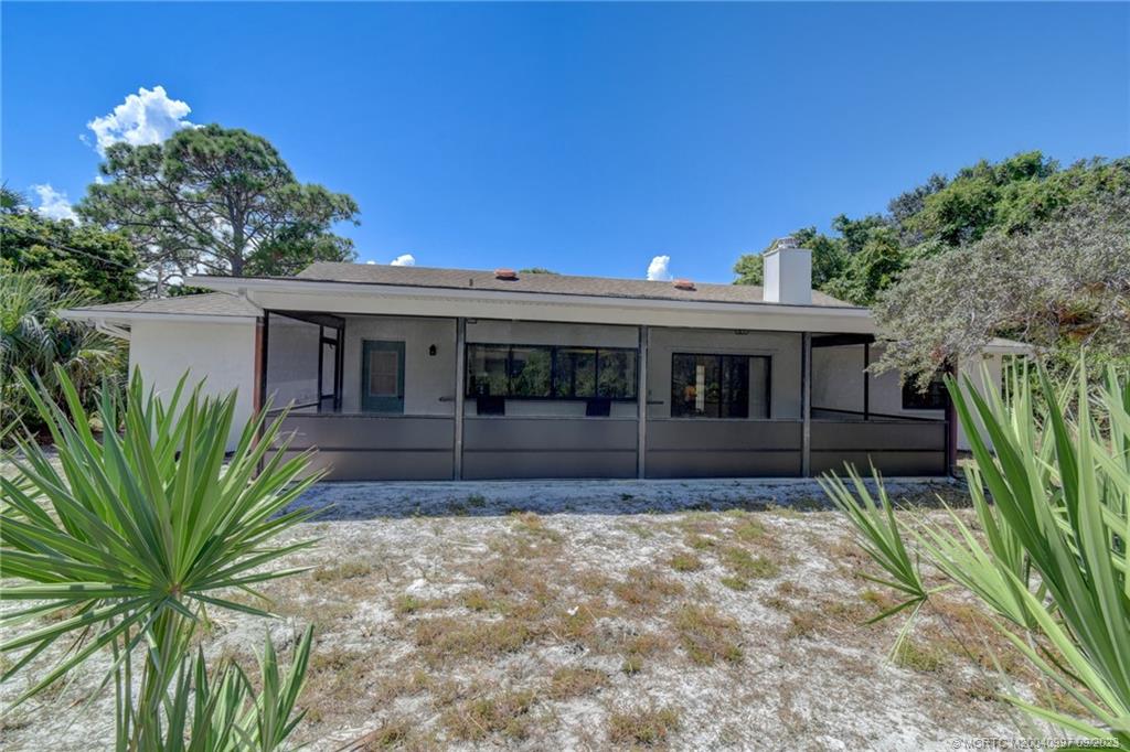 2923 NE Rosetree Drive