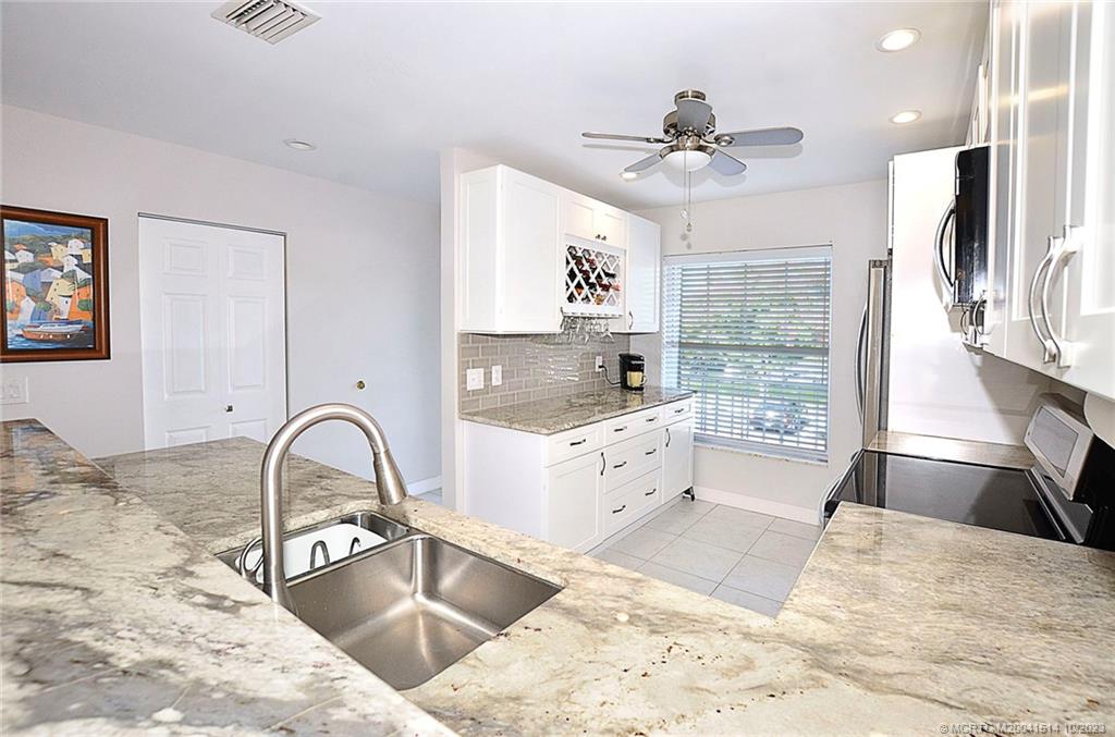 1854 SW Palm City Road 203