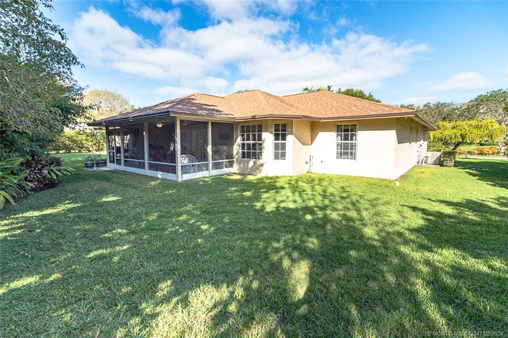 2440 NE Pinecrest Lakes Blvd