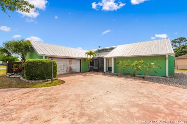 102 NE Dominican Terrace