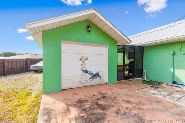 102 NE Dominican Terrace