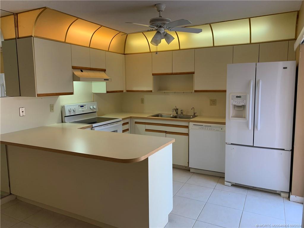 6490 SE Windsong Lane