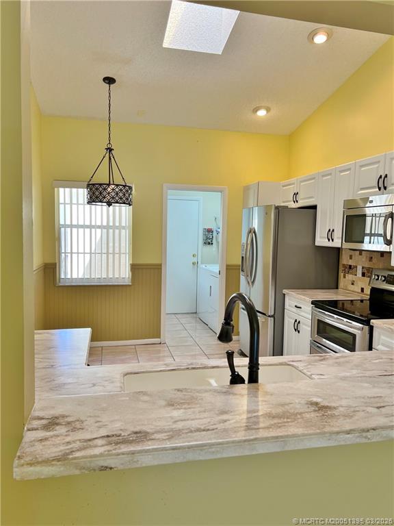 3903 SW Whispering Sound Drive